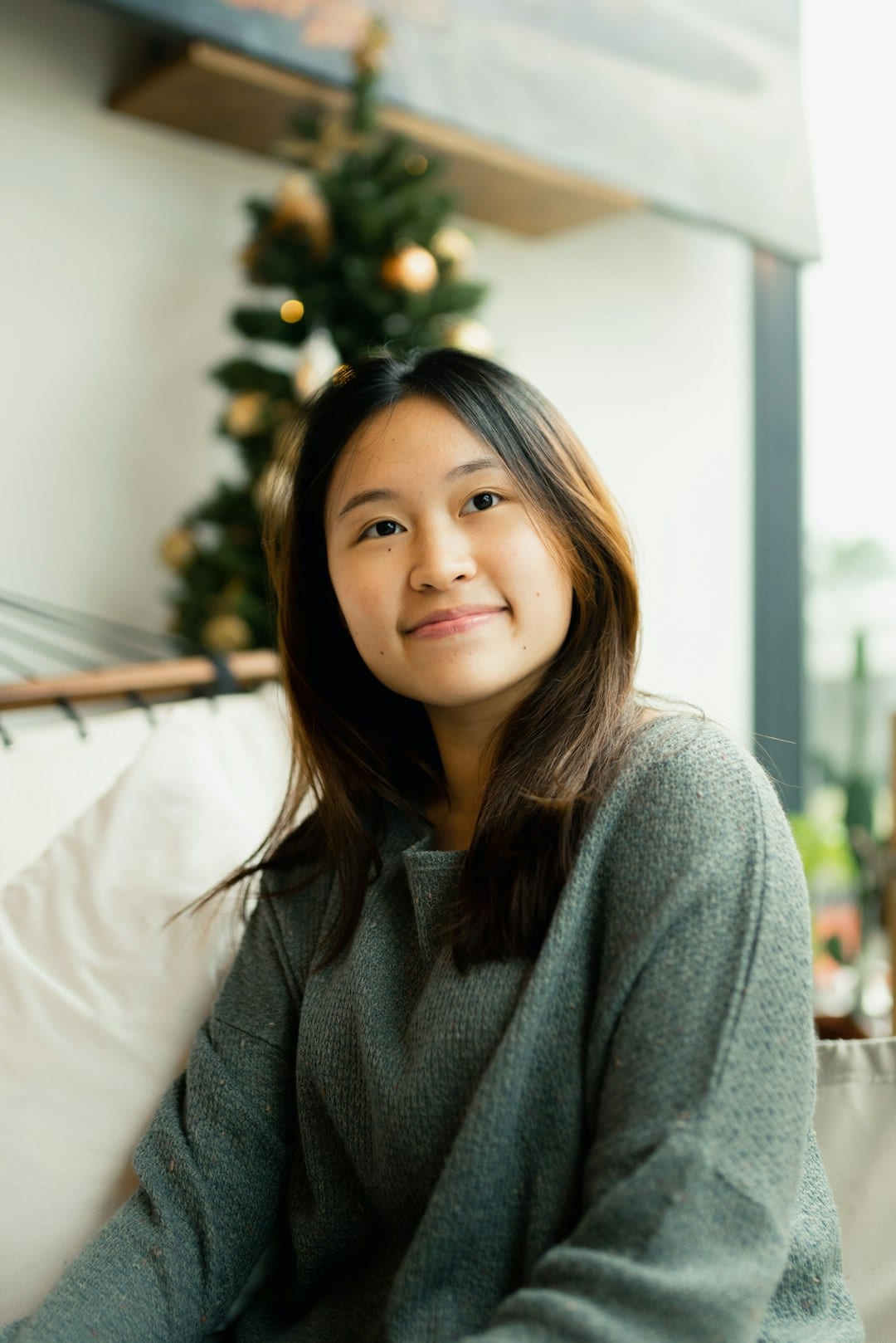 Professional portrait of Aisha, an experienced agent seeking better systems